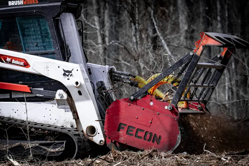Professional forestry mulching equipment clearing overgrown brush and dense vegetation in Detroit Metro, Michigan