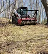 Commercial site preparation with a tracked forestry mulcher