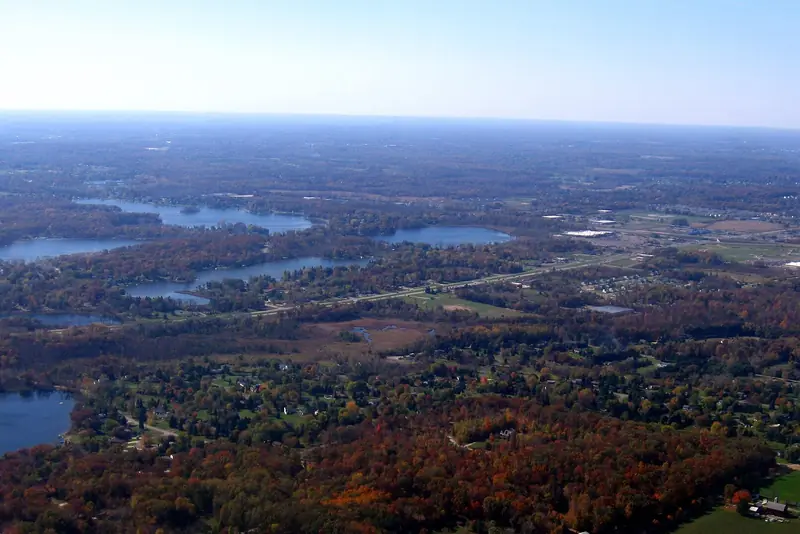 Hartland from the air: lakes, wooded ridges and the one- to five-acre lots between them.